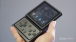 Anbernic-RG-Rotate-in-hand-scaled.jpg