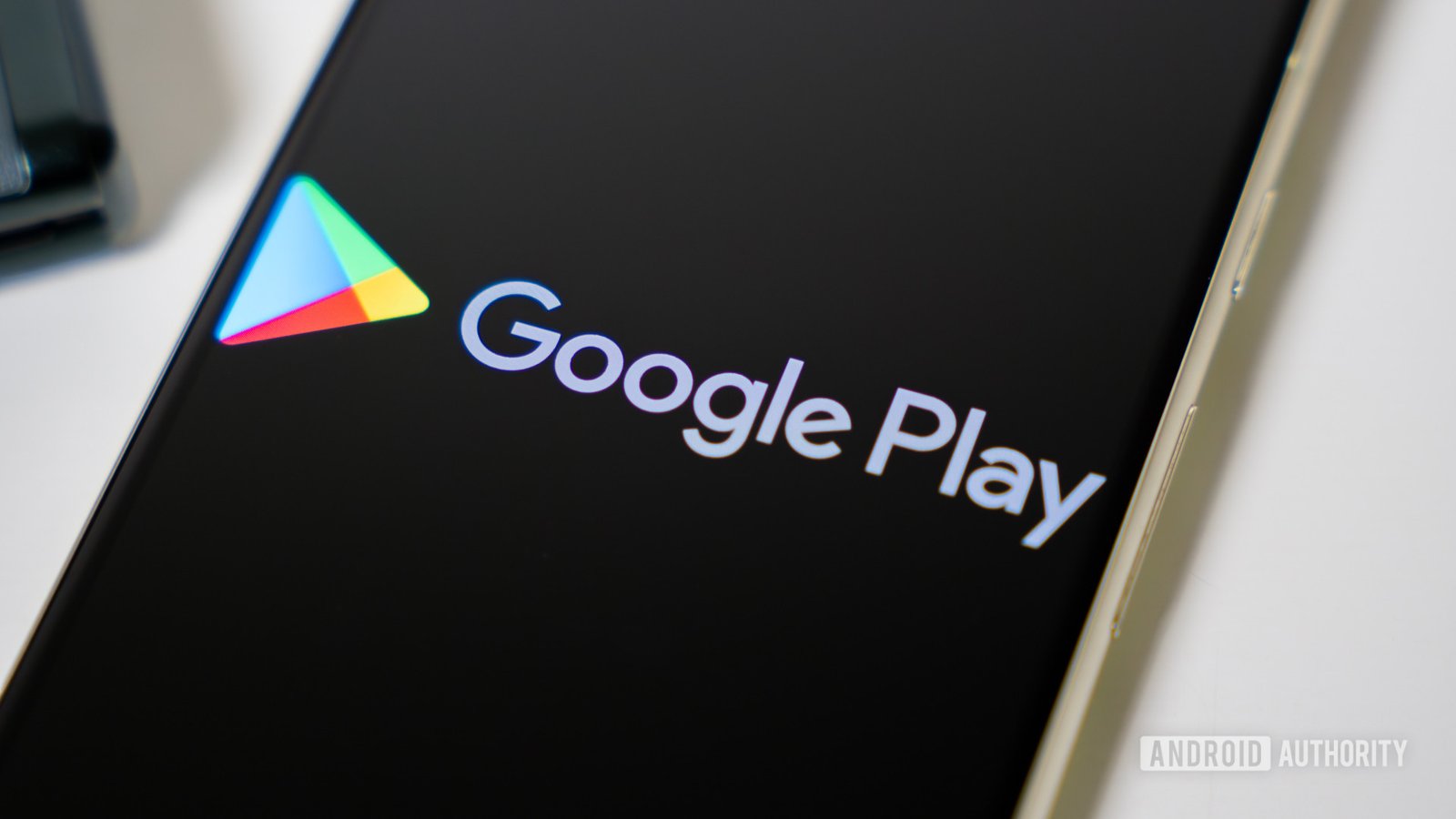 Google-Play-Store-logo-on-smartphone-stock-photo-2.jpg