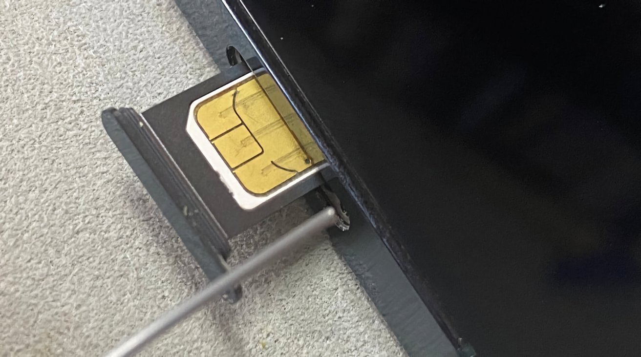68112-143568-53664-107901-46261-90109-sim-tray-iphone-xl-xl-xl.jpg
