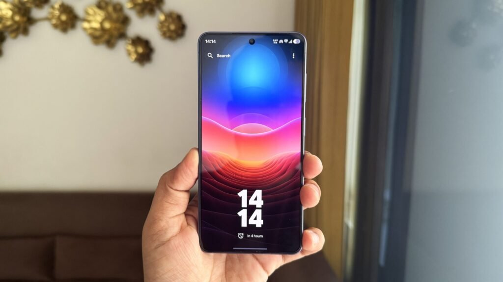 Android-phone-in-hand-showing-Kvaesitso-Launcher-scaled.jpg