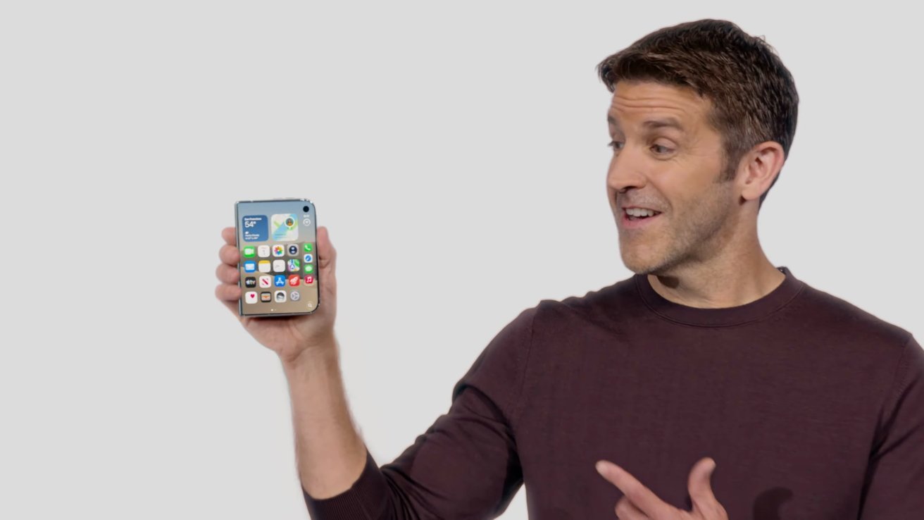 69477-146449-John-Ternus-iPhone-Duo-pointing-xl.jpg