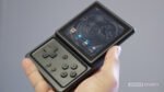Anbernic-RG-Rotate-in-hand-1-scaled.jpg